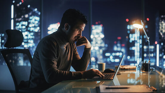 Business man working on laptop